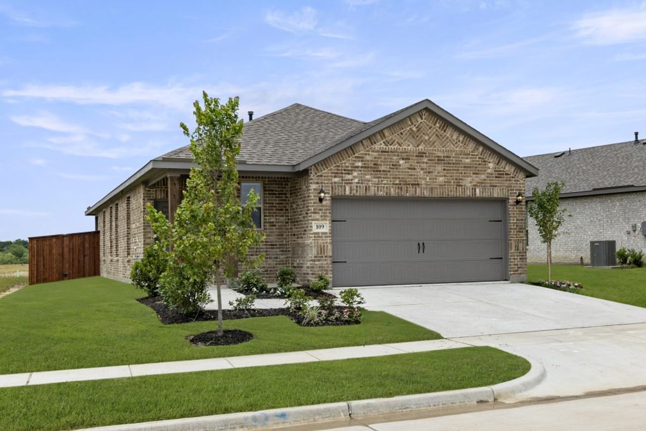 Representative exterior photo of a completed home built from the Cottonwood by Impression Homes in Northspur, Terrell, TX (Image 2).