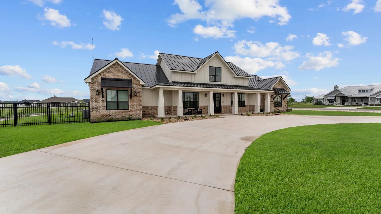 Representative exterior photo of a completed home built from the Model Home #2 by R&D Custom Builders in Century Oaks, Seguin, TX (Image 2). Representative exterior photo of a completed home built from the Model Home #2 by R&D Custom Builders in Century Oaks, Seguin, TX (Image 2).