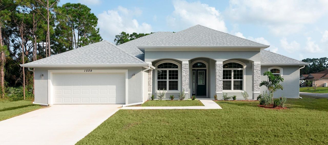 Representative exterior photo of a completed home built from the Villa Saraceno by Palladio Homes in Marion Oaks, Ocala, FL (Image 2).