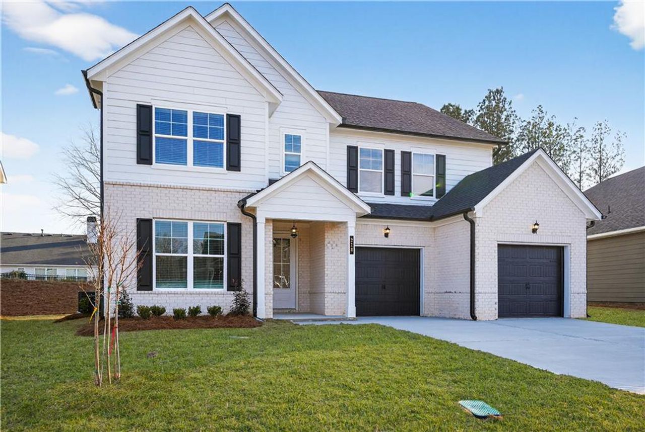 Front exterior of a new home in , Villa Rica, GA, highlighting curb appeal (Image 2).