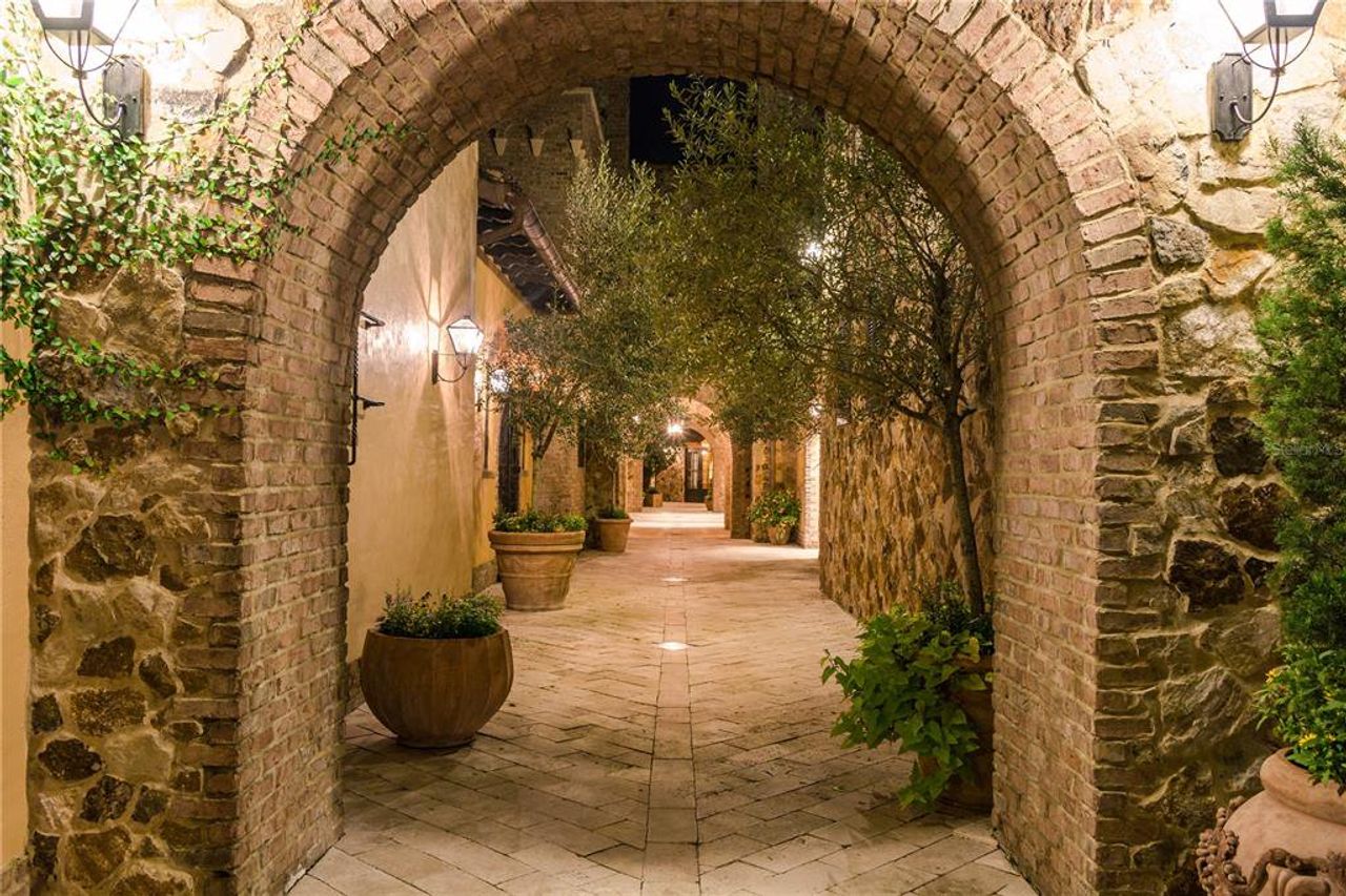 Exterior details and patio area of a home in Bella Collina, Montverde (Image 2).