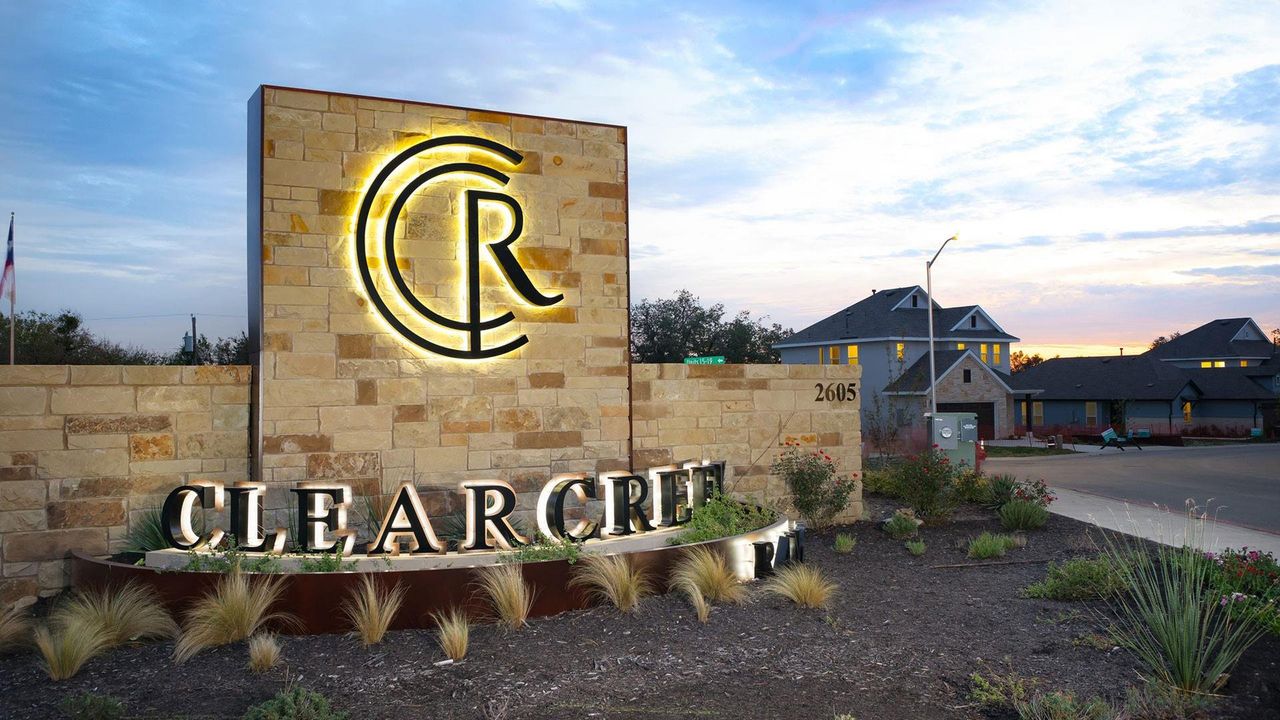 Front exterior of a new home in Clear Creek, Round Rock, TX, highlighting curb appeal (Image 2). Front exterior of a new home in Clear Creek, Round Rock, TX, highlighting curb appeal (Image 2).