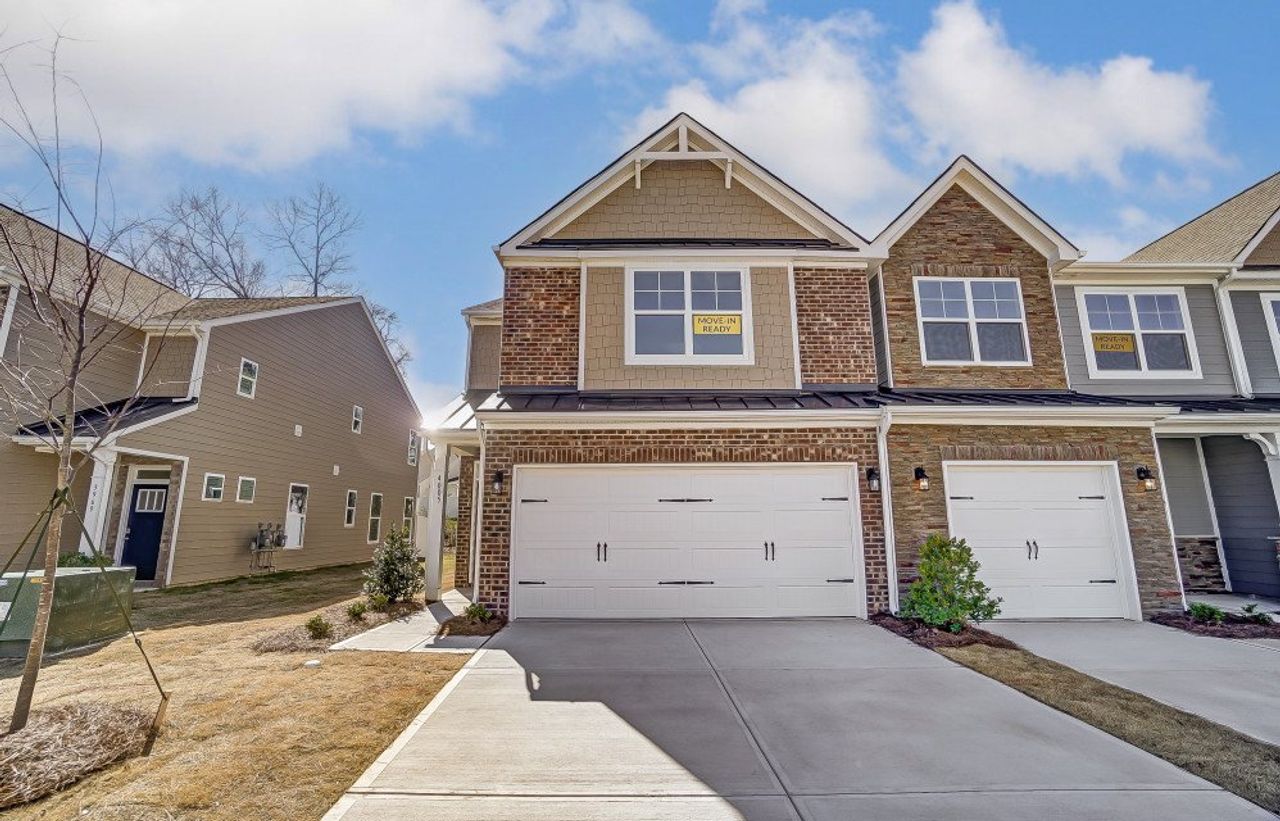 Front exterior of a new home in Villas at Dawsonville Townhomes, Dawsonville, GA, highlighting curb appeal (Image 2).