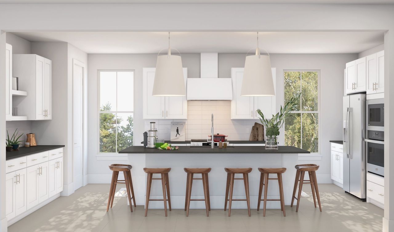 Kitchen with sleek pendant lighting