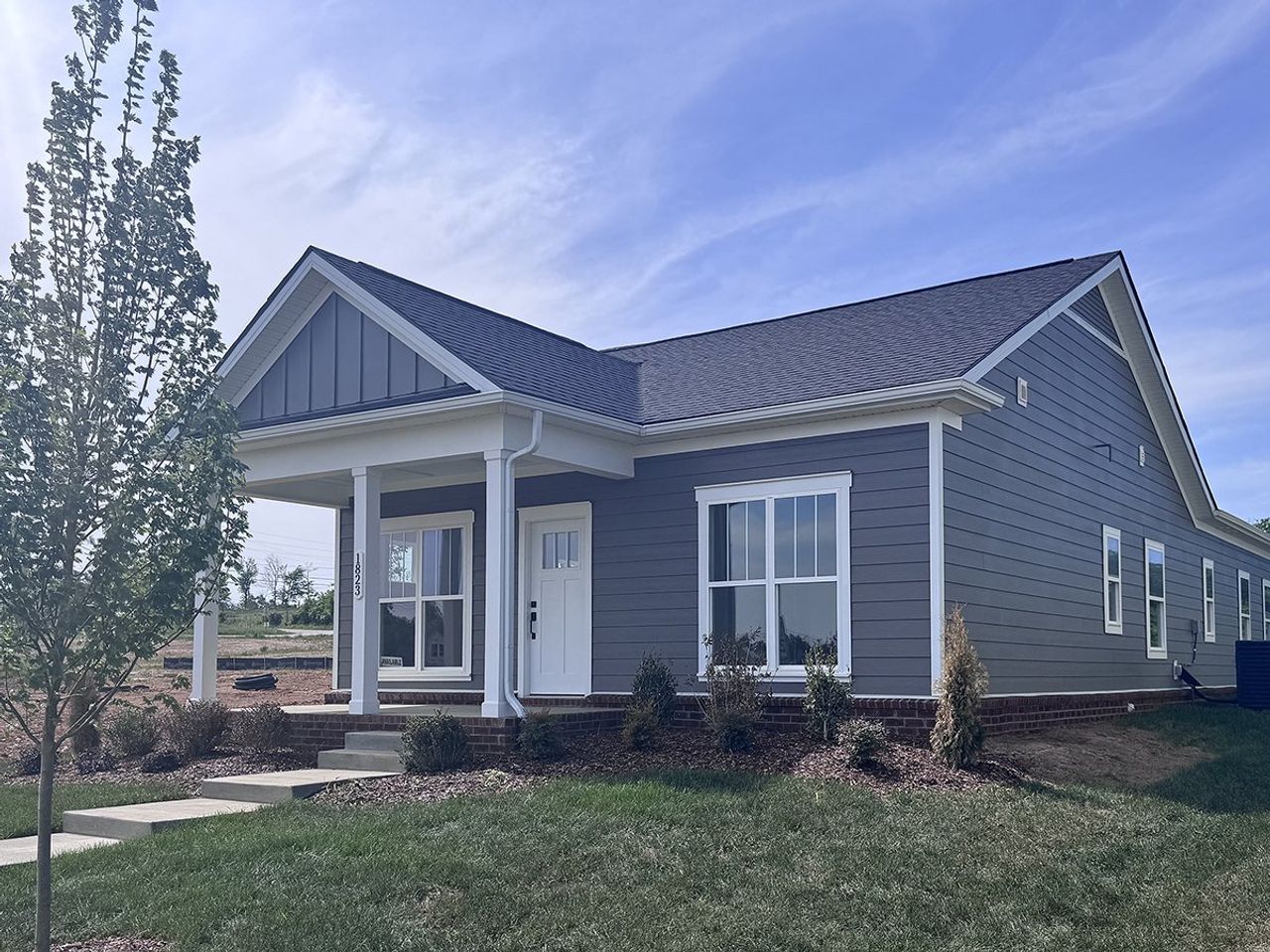 Front exterior of a new home in Marlon's Creek, Spring Hill, TN, highlighting curb appeal (Image 2).