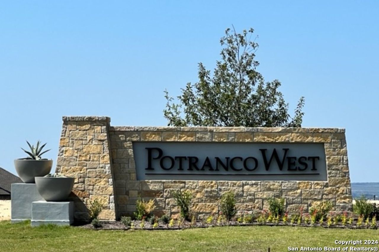 Front exterior of a new home in Potranco West, Castroville, TX, highlighting curb appeal (Image 2).