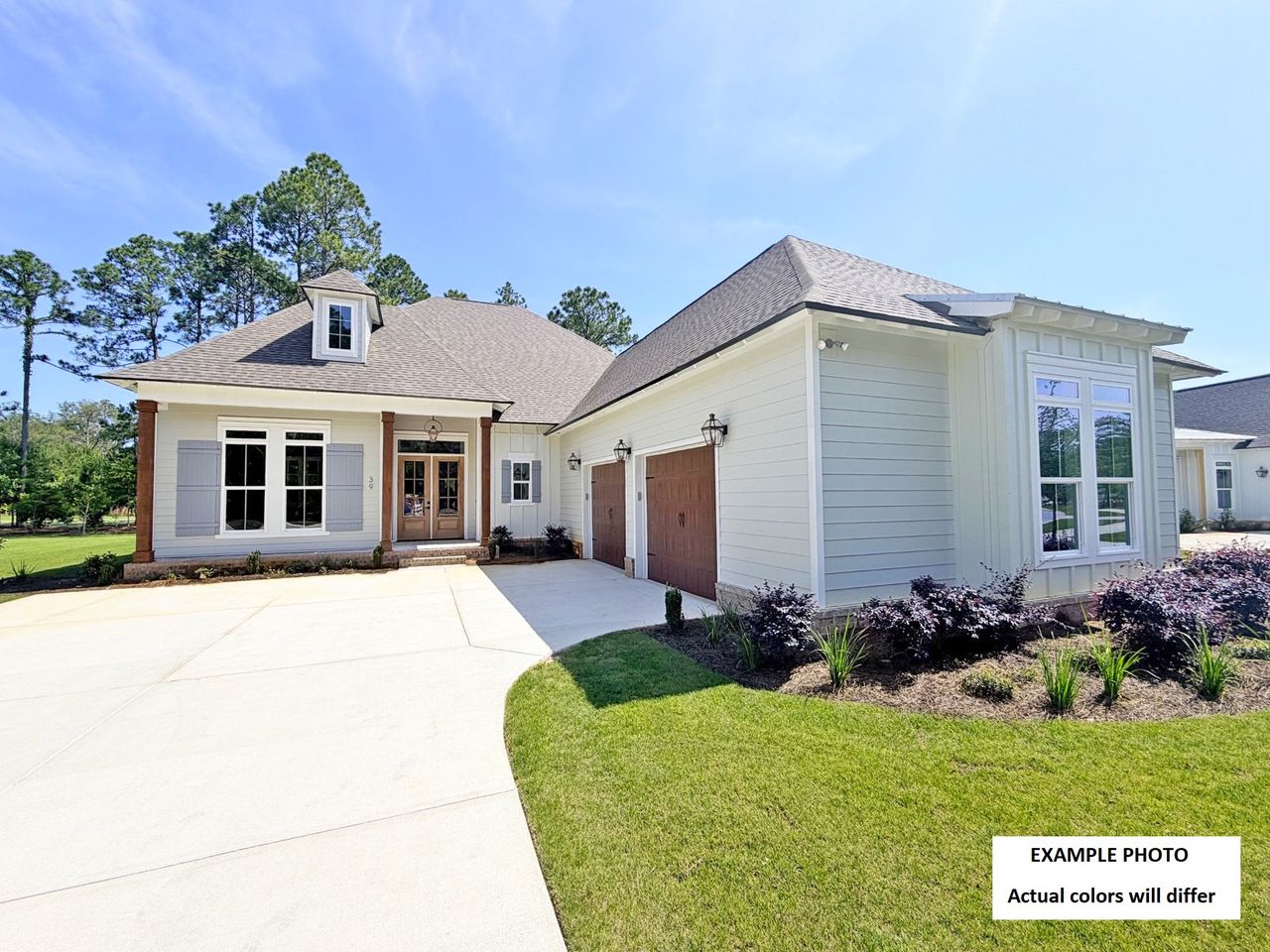 Front exterior of a new home in Steamboat Landing at Hammock Bay, Freeport, FL, highlighting curb appeal (Image 2).
