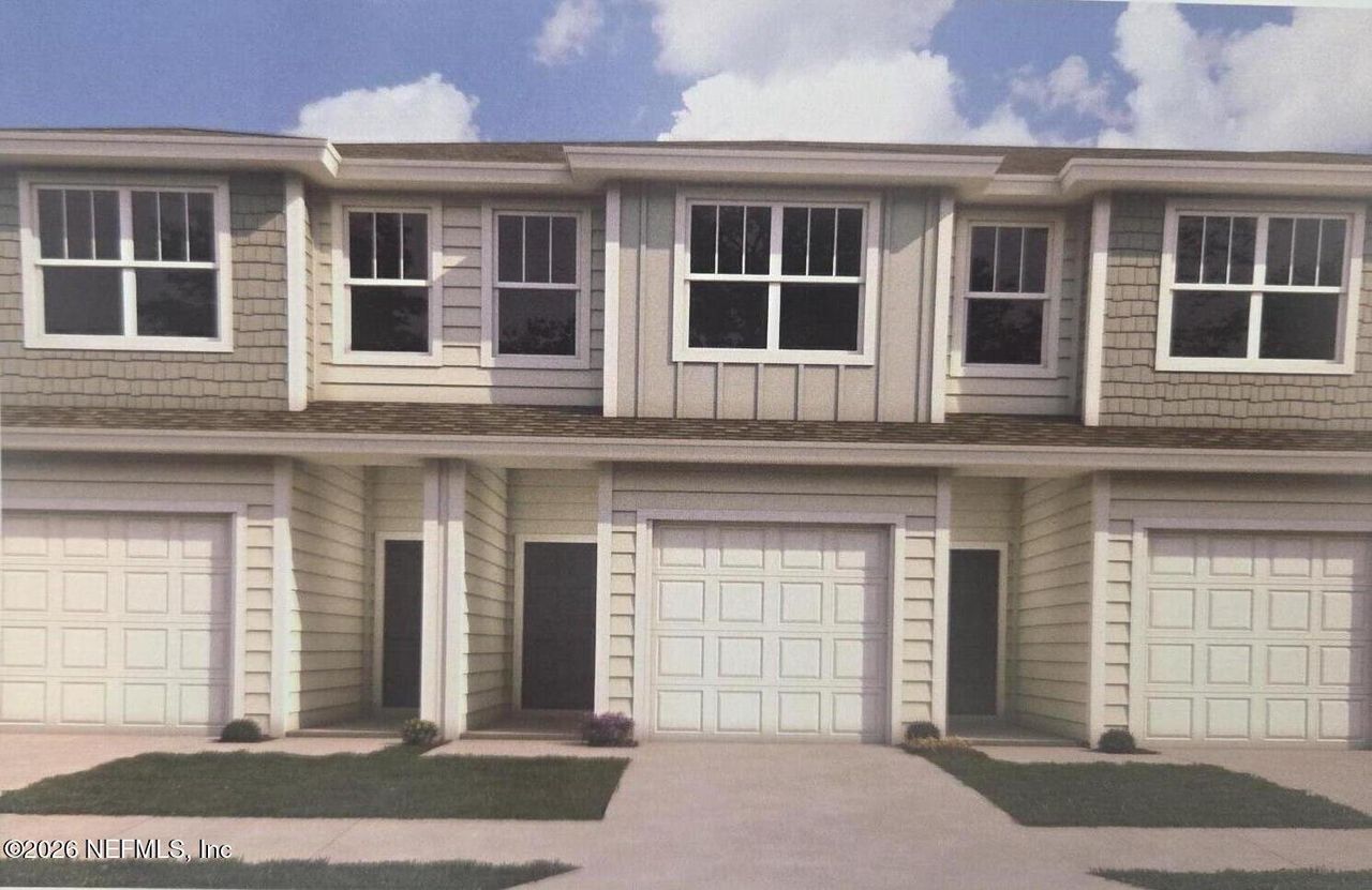 Front exterior of a new home in Deercreek Landing, Jacksonville, FL, highlighting curb appeal (Image 2).