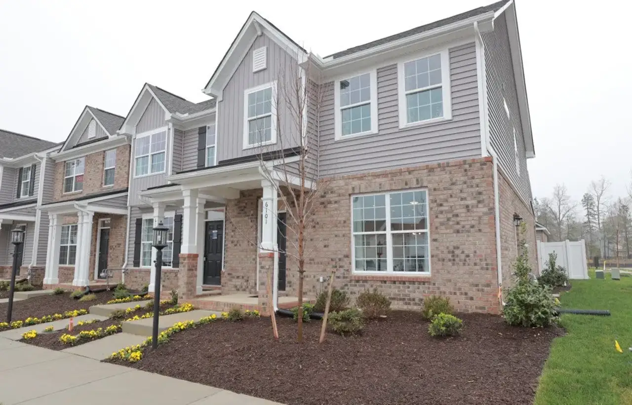 Representative exterior photo of a completed home built from the Edenton by Eastwood Homes in Lauren Park Townhomes, Lexington, SC (Image 2).