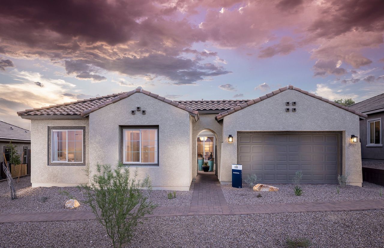 Front exterior of a new home in Vistoso Canyon Estates, Oro Valley, AZ, highlighting curb appeal (Image 2). Front exterior of a new home in Vistoso Canyon Estates, Oro Valley, AZ, highlighting curb appeal (Image 2).