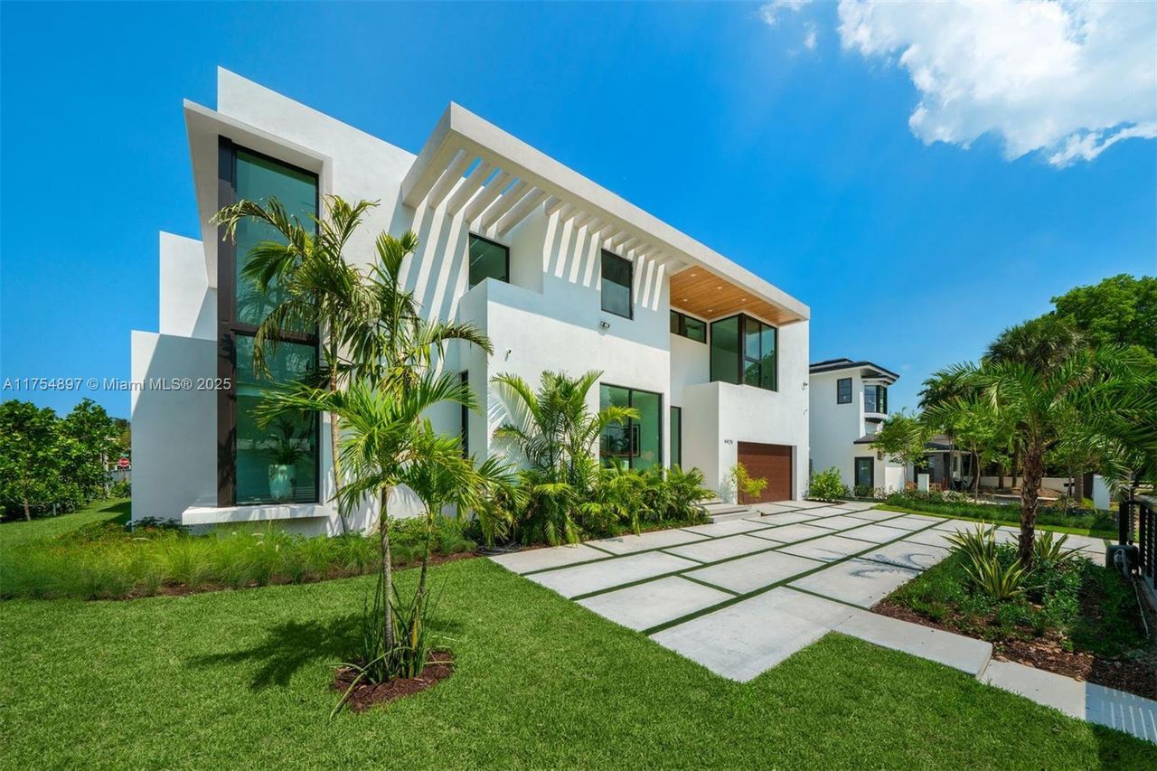 Front exterior of a new home in , Miami Beach, FL, highlighting curb appeal (Image 2).