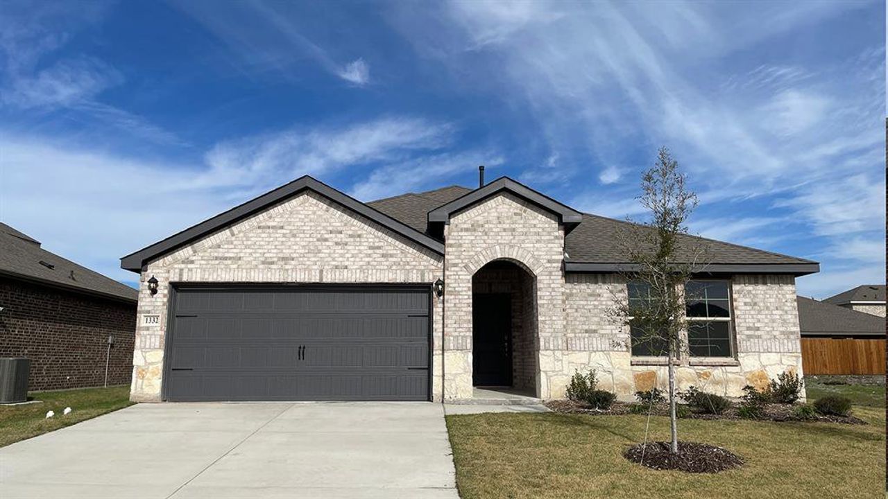 Front exterior of a new home in Liberty Crossing, Royse City, TX, highlighting curb appeal (Image 2).