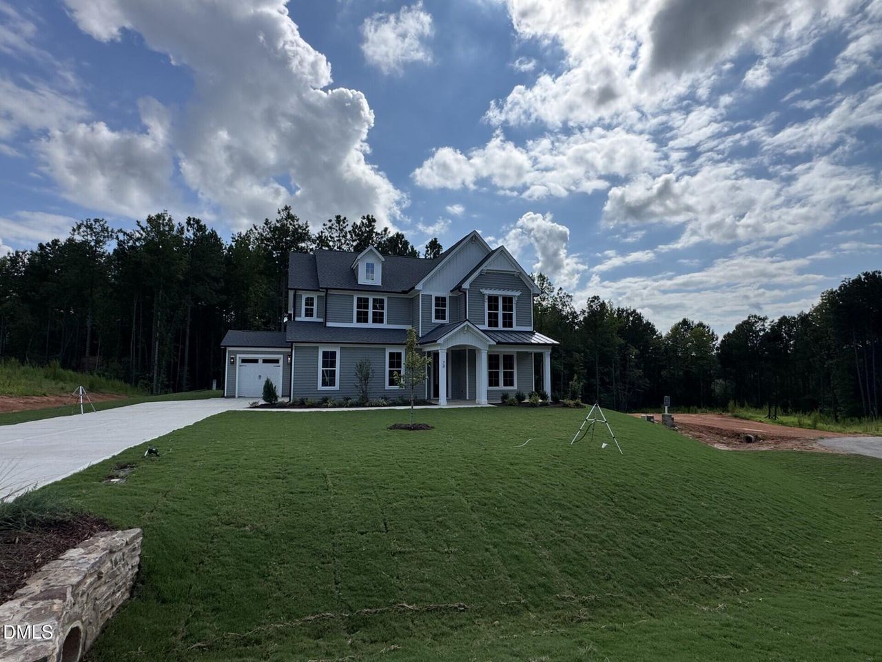 Front exterior of a new home in Baylee Ridge, Selma, NC, highlighting curb appeal (Image 2). Front exterior of a new home in Baylee Ridge, Selma, NC, highlighting curb appeal (Image 2).
