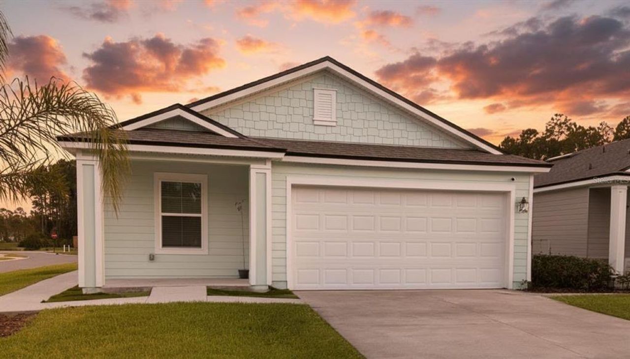 Front exterior of a new home in , Bunnell, FL, highlighting curb appeal (Image 2).