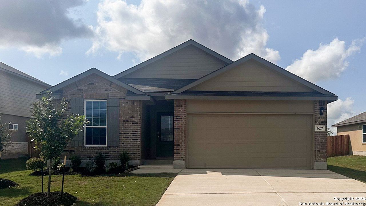 Front exterior of a new home in Steele Creek, Cibolo, TX, highlighting curb appeal (Image 2). Front exterior of a new home in Steele Creek, Cibolo, TX, highlighting curb appeal (Image 2).