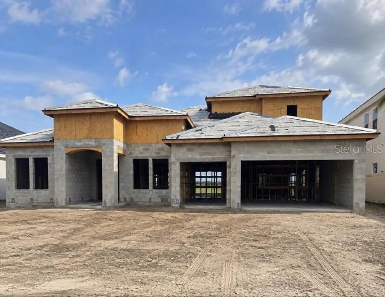In-progress construction of a new home in Oakfield, Parrish, FL (Image 2).