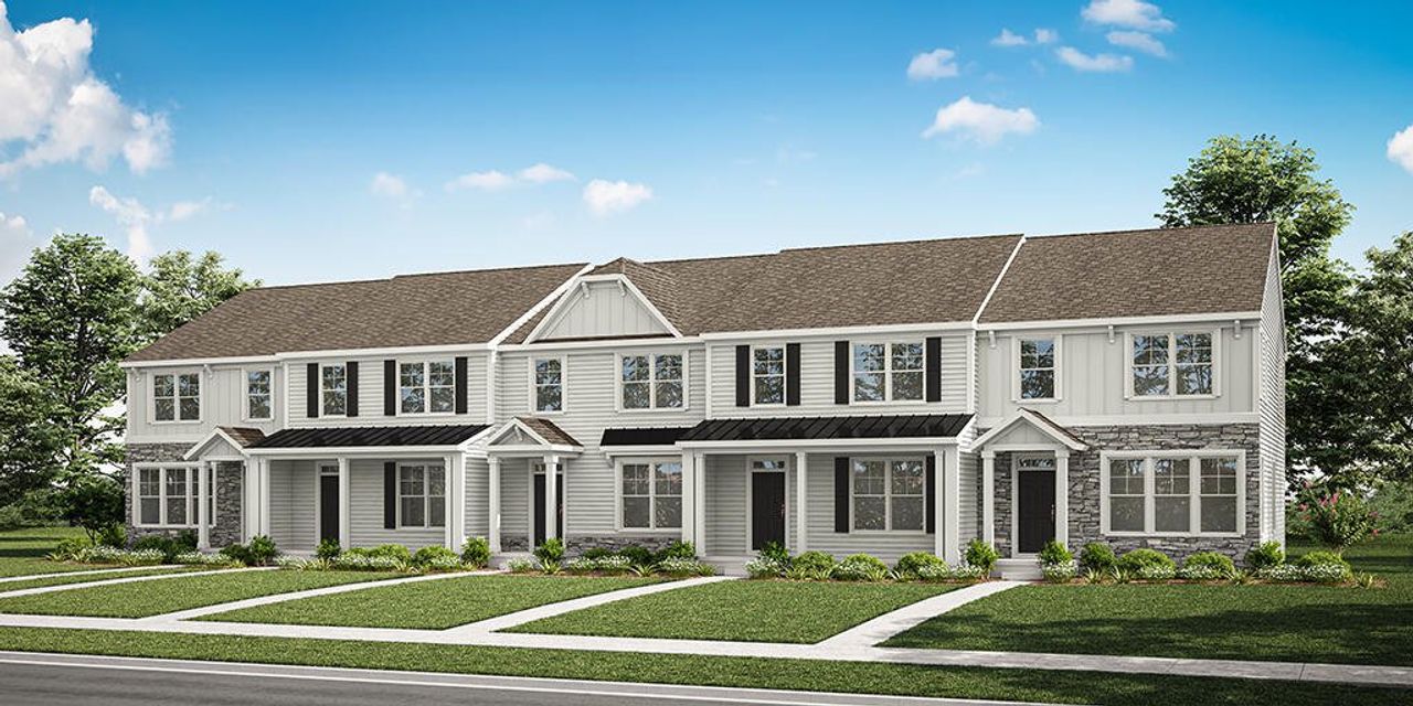 Front exterior of a new home in Bryton Crossing Townhomes, Huntersville, NC, highlighting curb appeal (Image 2).