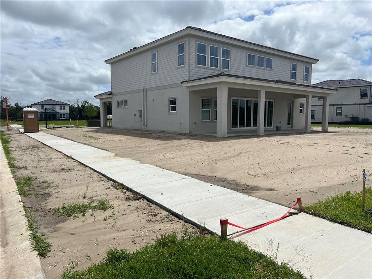 Exterior details and patio area of a home in North River Ranch, Parrish (Image 2).