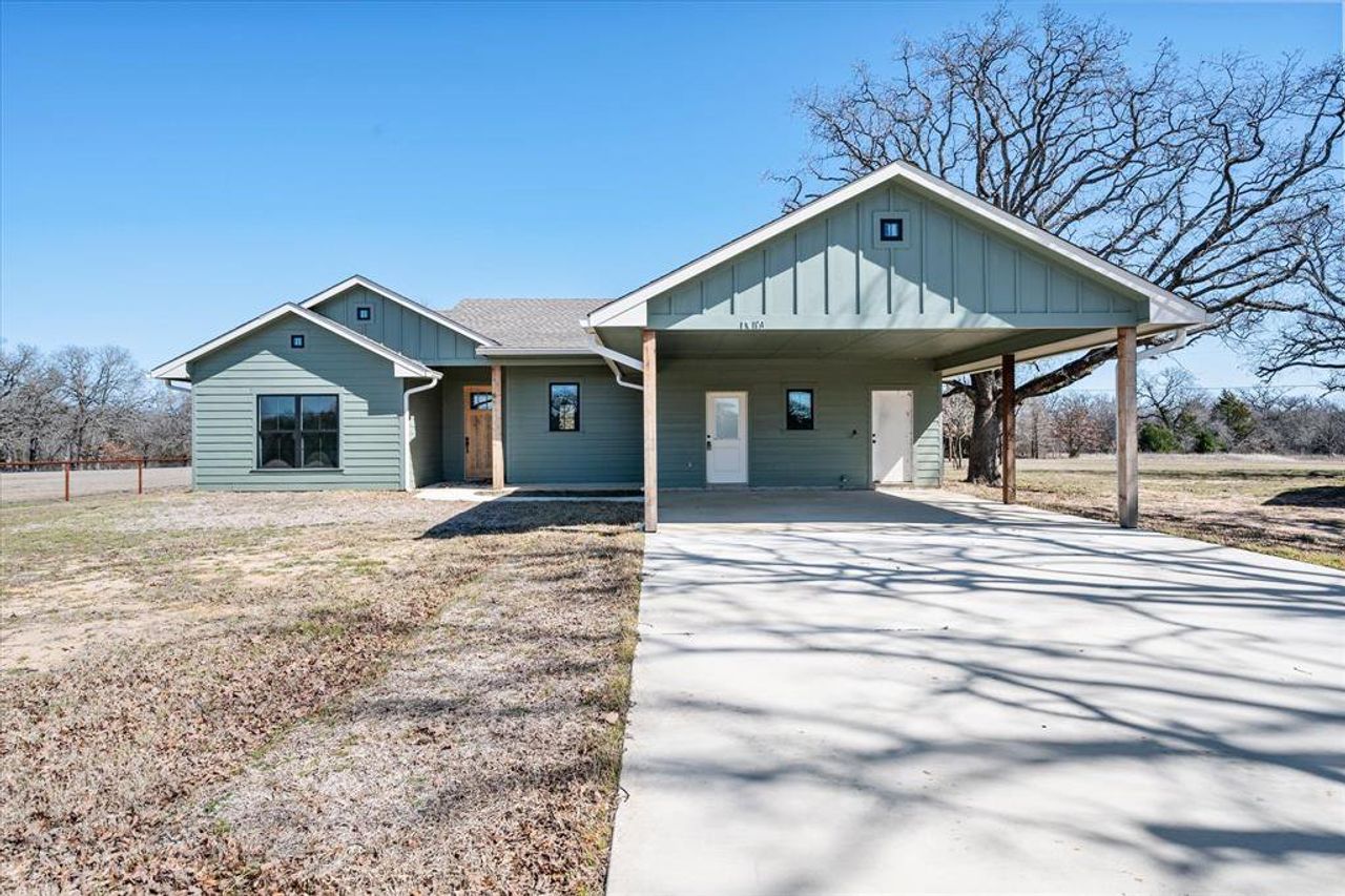 Front exterior of a new home in , Streetman, TX, highlighting curb appeal (Image 2). Front exterior of a new home in , Streetman, TX, highlighting curb appeal (Image 2).