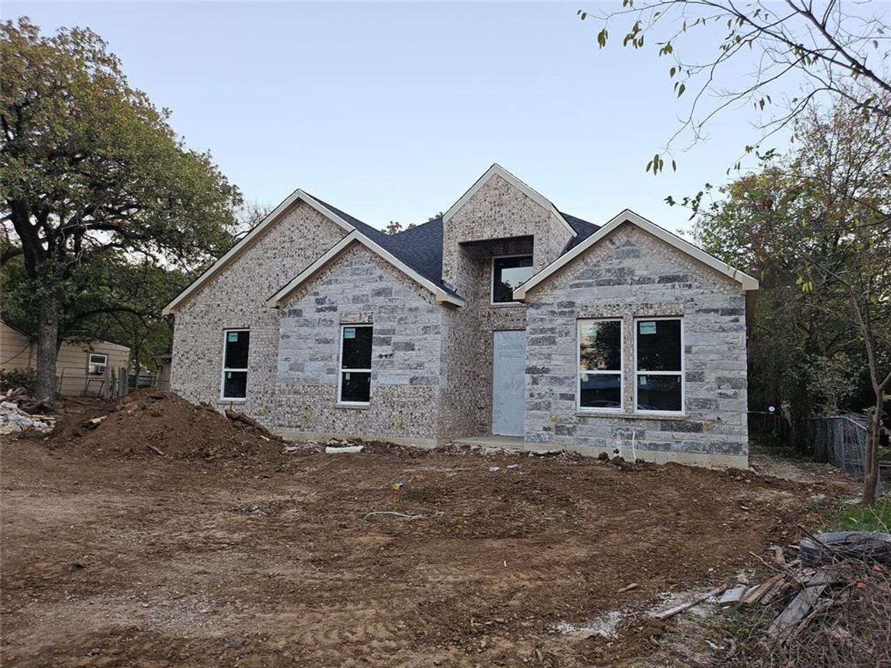 View of front of home featuring stone siding