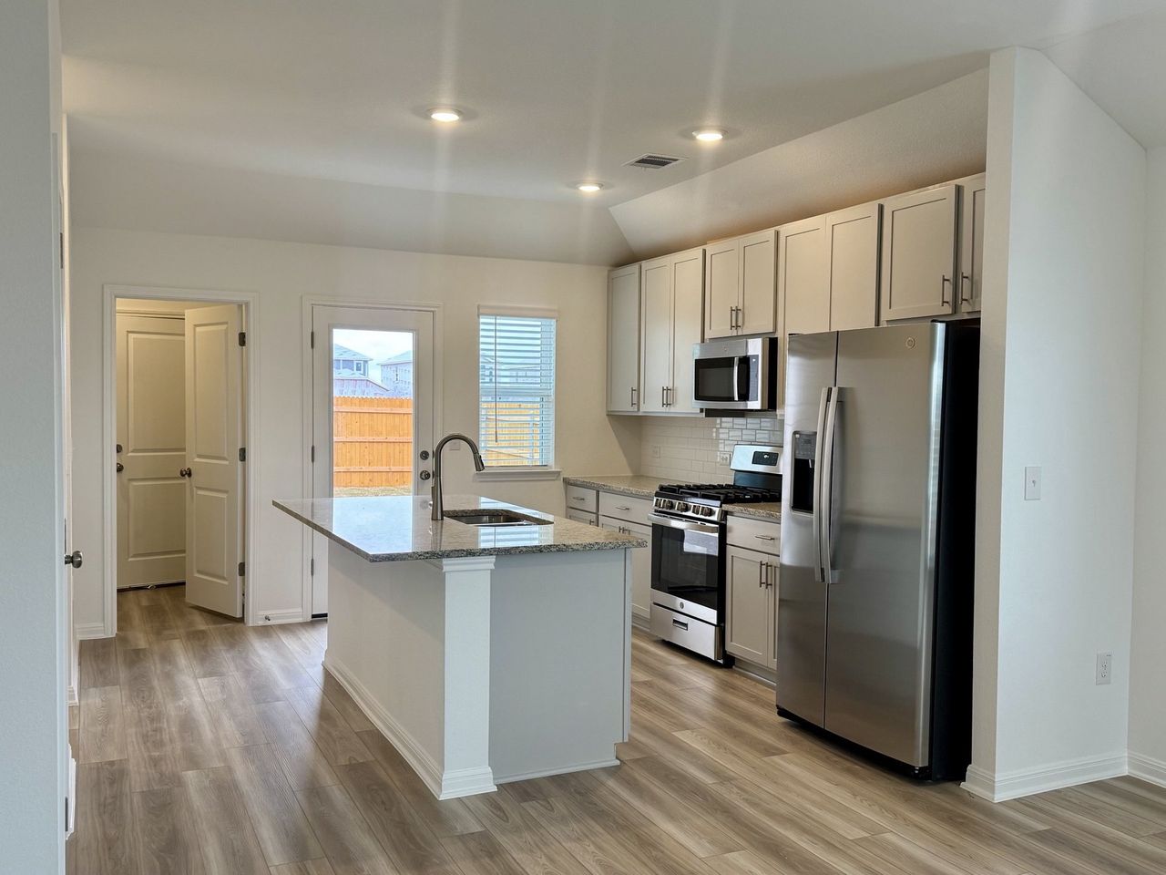 Furnished interior view inside a new home in Longview 40s - Alley, Del Valle (Image 2).