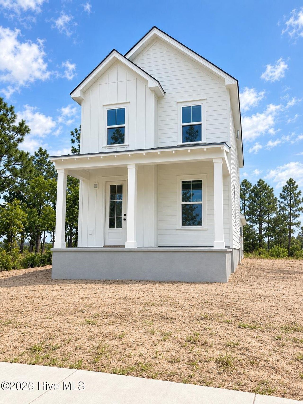 Front exterior of a new home in Riverlights, Wilmington, NC, highlighting curb appeal (Image 2).