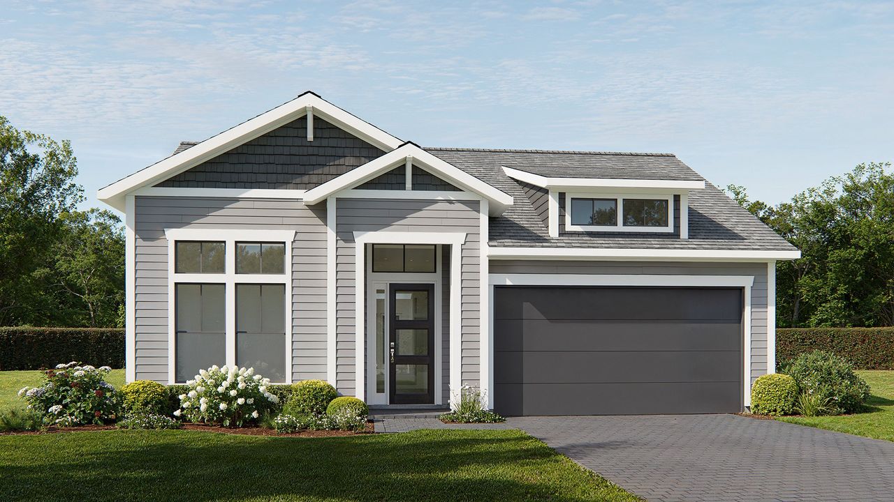 Representative exterior photo of a completed home built from the 2555MC by MasterCraft Builder Group in Madeira, St. Augustine, FL (Image 2).