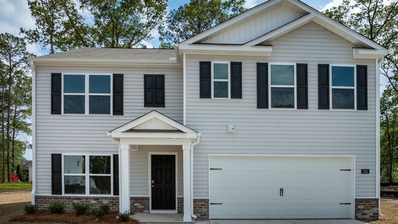 Representative exterior photo of a completed home built from the Hayden by D.R. Horton in Greystone North, Stoneville, NC (Image 2).
