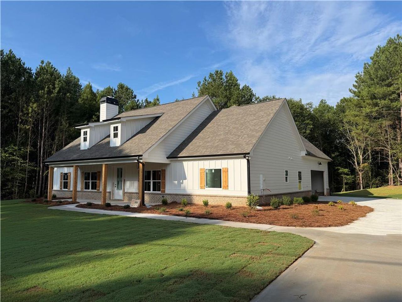 Front exterior of a new home in , Covington, GA, highlighting curb appeal (Image 2).