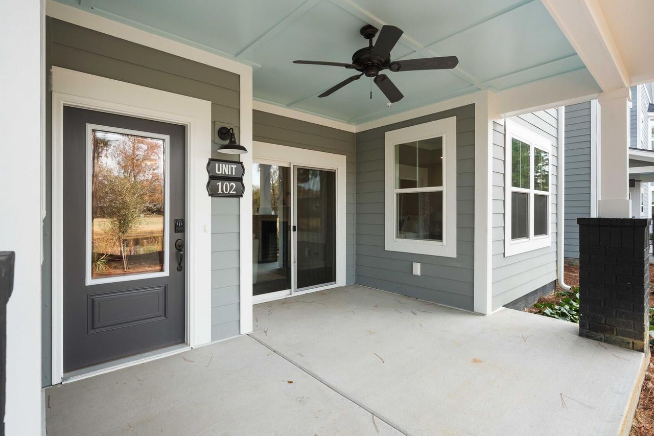 Exterior details and patio area of a home in Middleborough Condos at Shadowmoss, Charleston (Image 2).