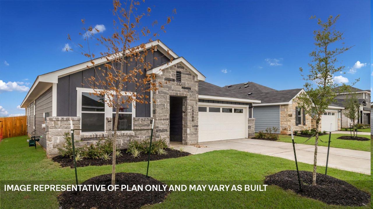 Front exterior of a new home in Monarch Ranch, Manor, TX, highlighting curb appeal (Image 2). Front exterior of a new home in Monarch Ranch, Manor, TX, highlighting curb appeal (Image 2).