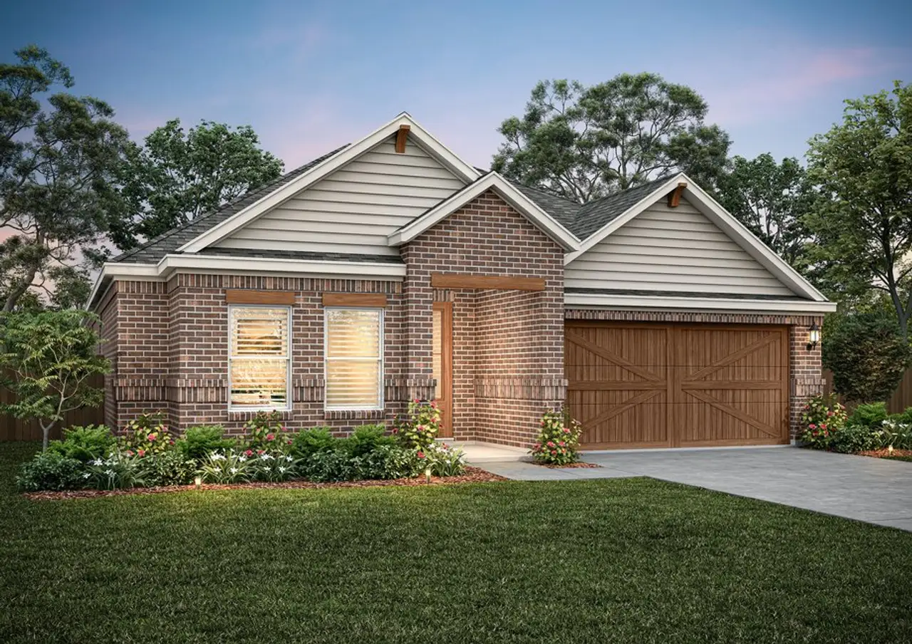 The Erie is a beautiful one-story home with a brick exterior and siding details.