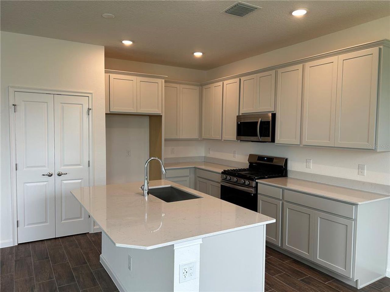 Furnished interior view inside a new home in Summerbrooke, Mount Dora (Image 2).