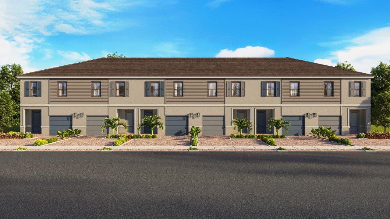 Representative exterior photo of a completed home built from the Terra by D.R. Horton in Blossom Trail, Greenacres, FL (Image 2).