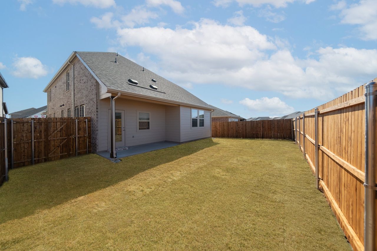 Exterior details and patio area of a home in Churchill, Anna (Image 2).
