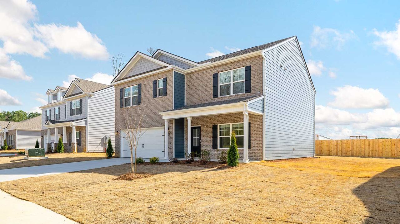 Front exterior of a new home in Fairview Hills, Cleveland, TN, highlighting curb appeal (Image 2). Front exterior of a new home in Fairview Hills, Cleveland, TN, highlighting curb appeal (Image 2).