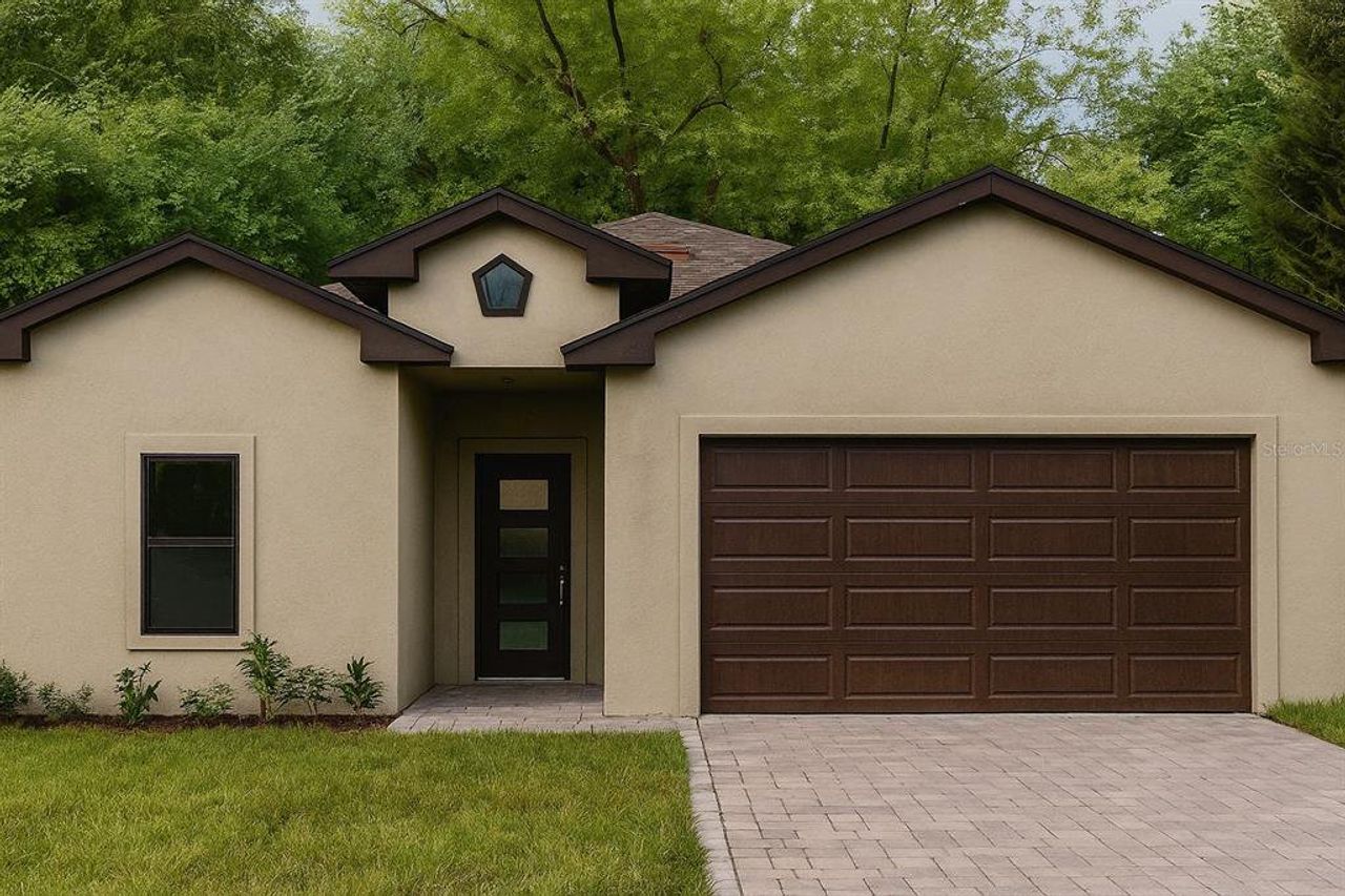 Front exterior of a new home in , Dunedin, FL, highlighting curb appeal (Image 2).
