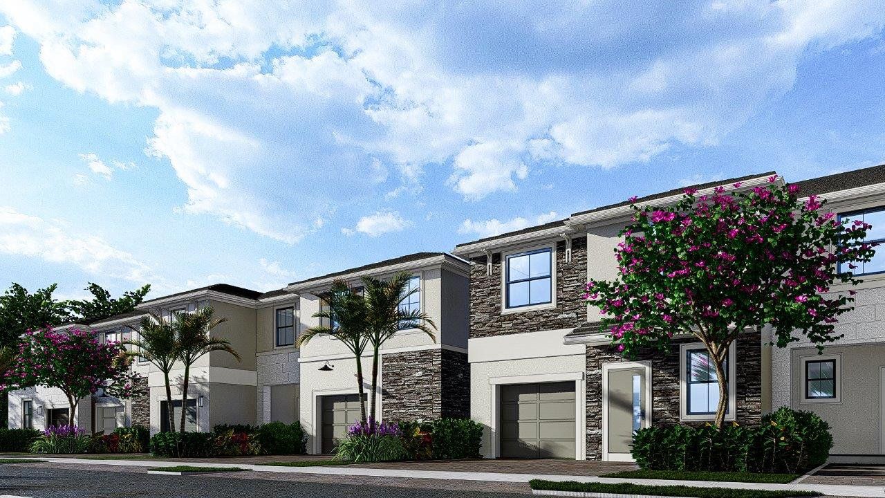 Representative exterior photo of a completed home built from the Dawley by D.R. Horton in Vintage Oaks, Palm Beach Gardens, FL (Image 2).