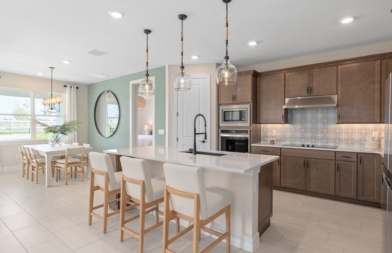 Furnished interior view inside a new home in The Estates at Nona Sound, Orlando (Image 2).