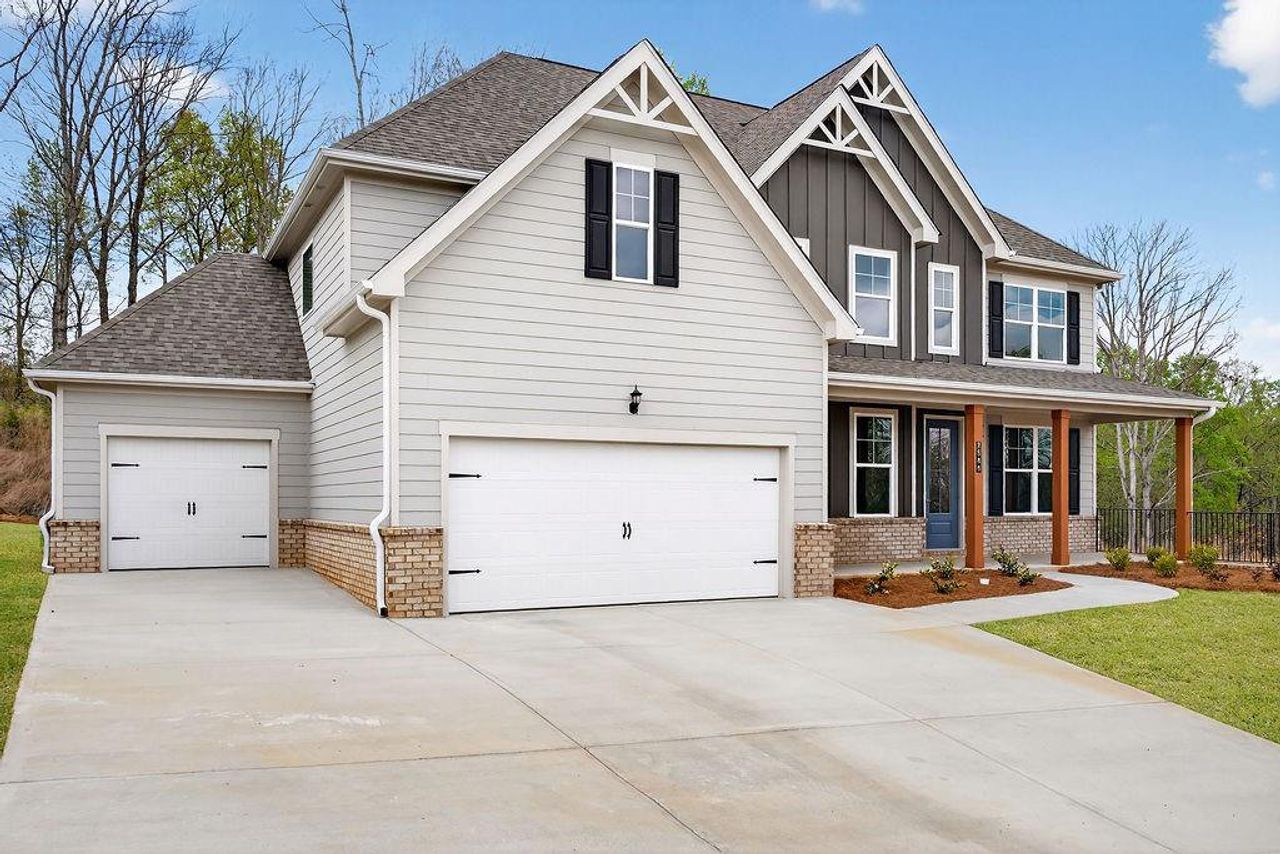 Front exterior of a new home in , Gainesville, GA, highlighting curb appeal (Image 2).