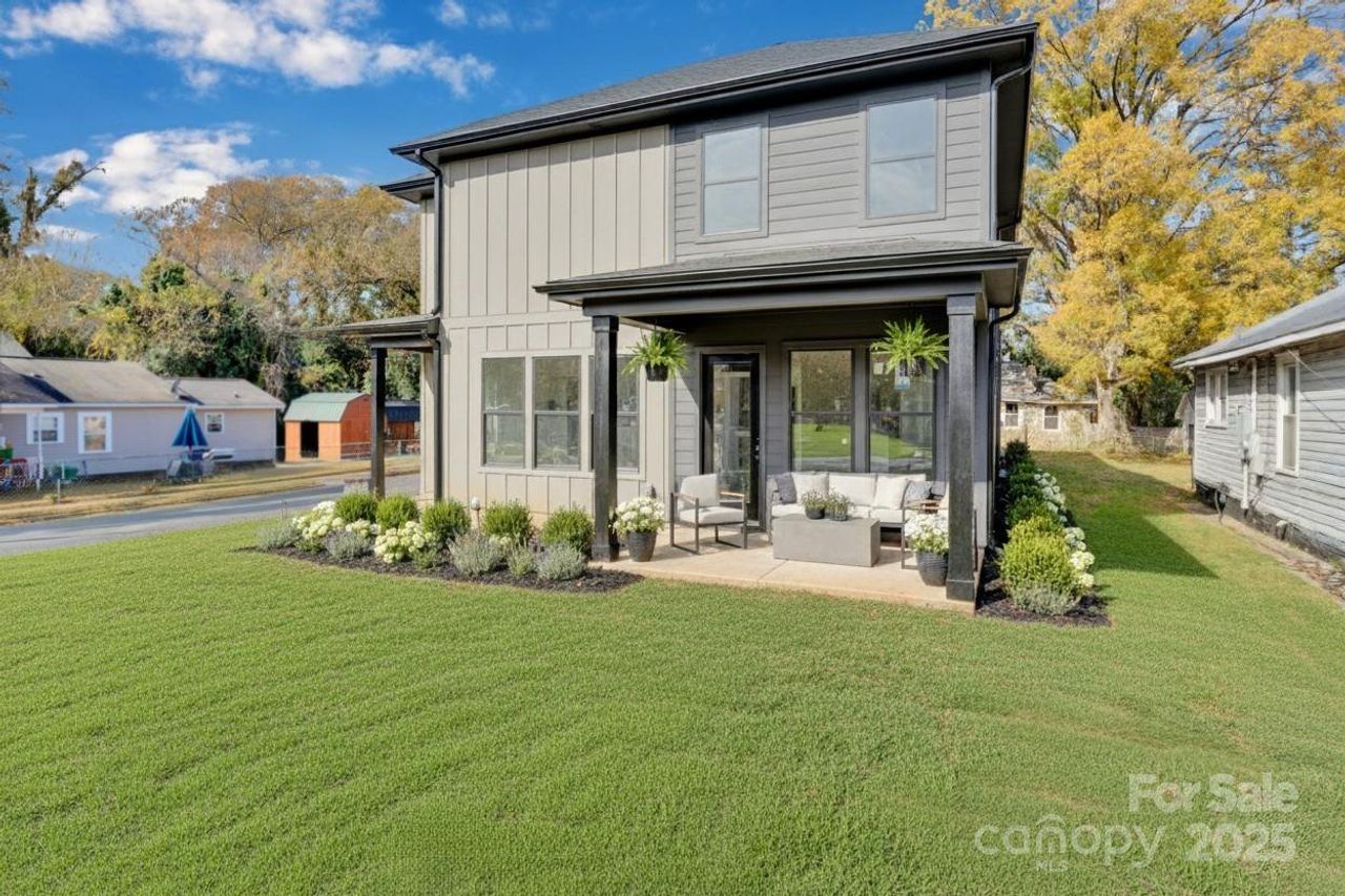 Exterior details and patio area of a home in , Charlotte (Image 2). Exterior details and patio area of a home in , Charlotte (Image 2).