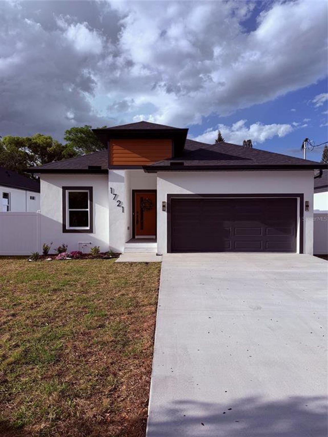 Front exterior of a new home in , Tampa, FL, highlighting curb appeal (Image 2). Front exterior of a new home in , Tampa, FL, highlighting curb appeal (Image 2).