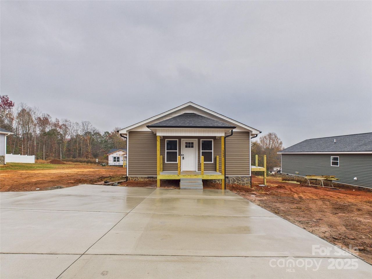 Front exterior of a new home in , Granite Falls, NC, highlighting curb appeal (Image 2).