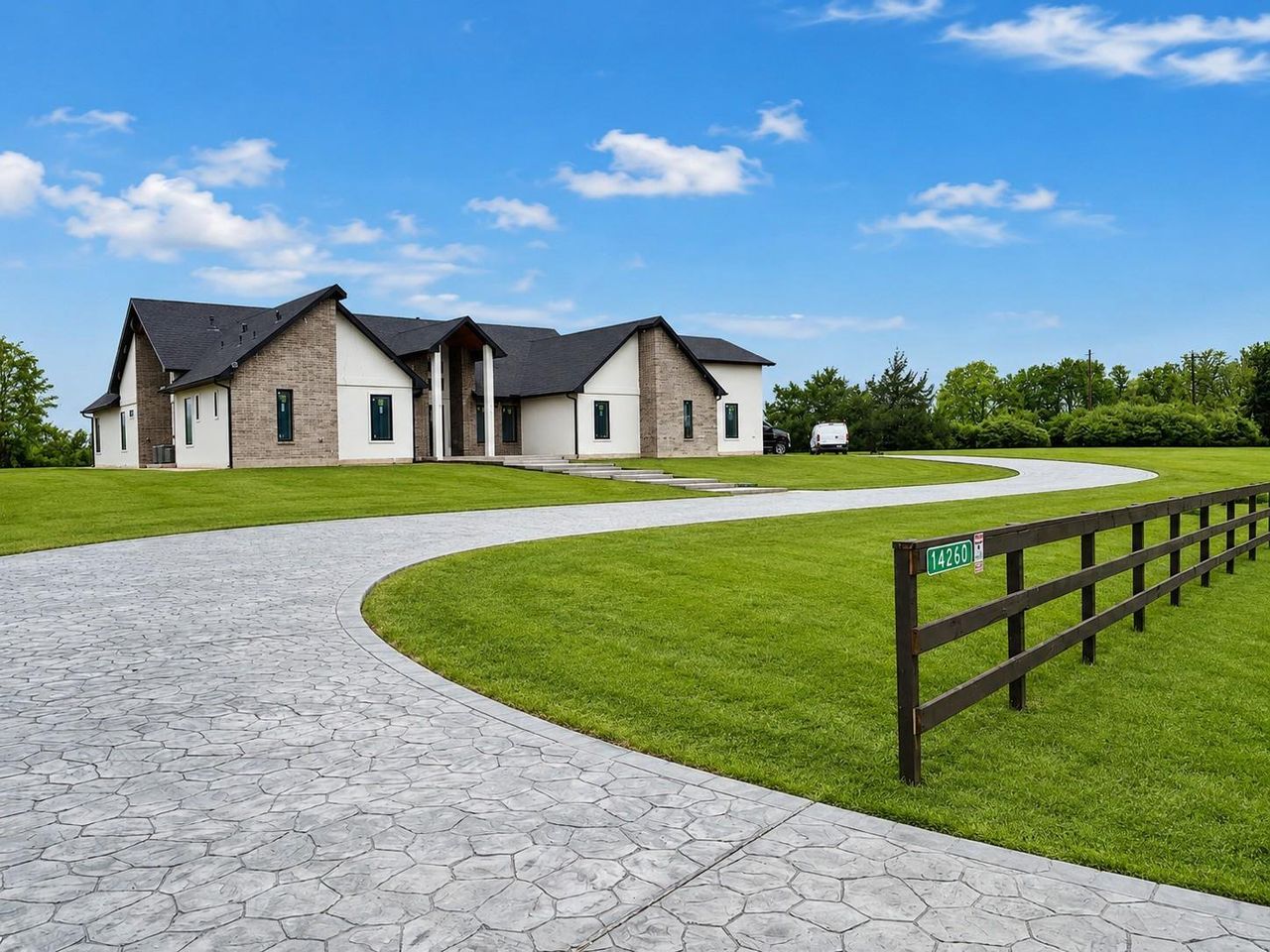 Welcome to this striking custom Modern Ranch Estate on 2.144 acres in Washington County. *sod is in process and has been touched up digitally* Welcome to this striking custom Modern Ranch Estate on 2.144 acres in Washington County. *sod is in process and has been touched up digitally*