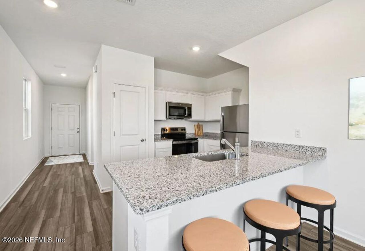 Furnished interior view inside a new home in , Jacksonville (Image 2).