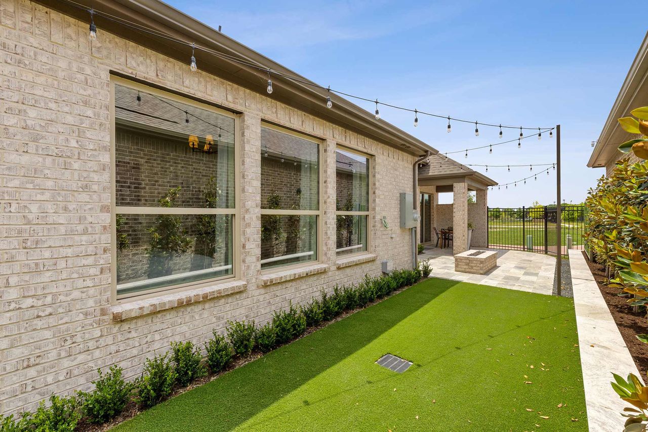 Representative exterior details of a home built from the The Brooklyn by David Weekley Homes in Elements at Viridian - Garden Series, Arlington (Image 2). Representative exterior details of a home built from the The Brooklyn by David Weekley Homes in Elements at Viridian - Garden Series, Arlington (Image 2).