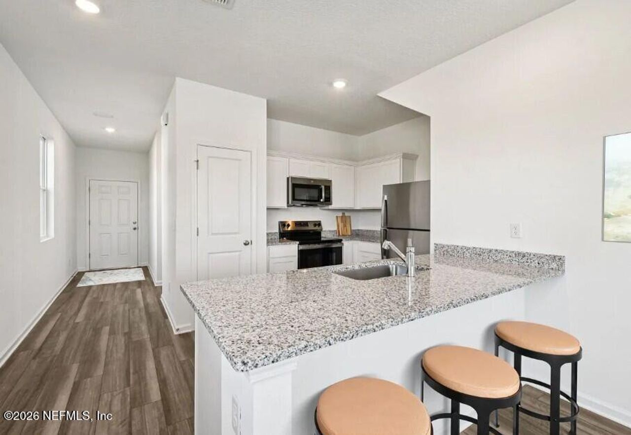 Furnished interior view inside a new home in , Jacksonville (Image 2).
