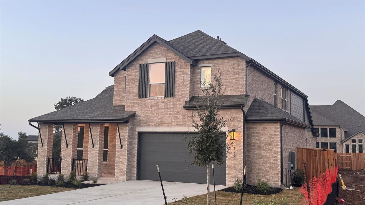 Front exterior of a new home in , Georgetown, TX, highlighting curb appeal (Image 2).