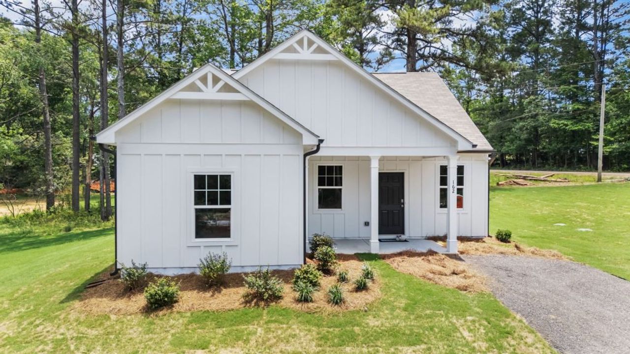 Front exterior of a new home in Clemit Harris Place, Newnan, GA, highlighting curb appeal (Image 2).