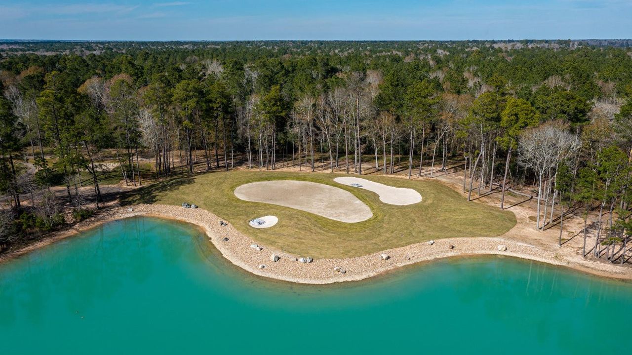 The layout includes five sets of tees to accommodate all skill levels, with water hazards coming into play on 10 hole
